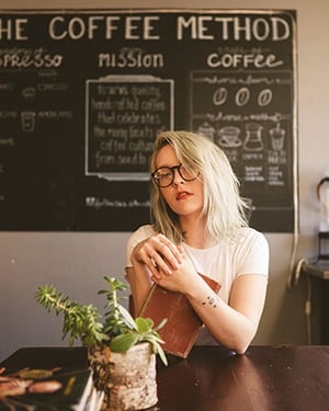 Girl sitting at table