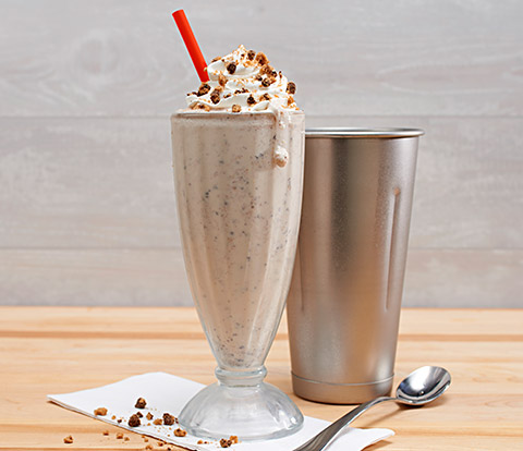 CHIPS AHOY! Milkshake in glass with metal shaker.